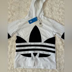 Brand New White Hooded Sports Top, White Hooded Top For Sports, White Graphic Print Hooded Top, White Hooded Top With Graphic Print, White Winter Sweatshirt With Three Stripes Branding, Winter White Sweatshirt With Three Stripes Branding, White Logo Print Hoodie For Spring, White Adidas Tops For Spring, White Three Stripes Sweatshirt For Sports Season