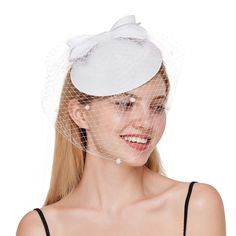 PRICES MAY VARY. High-Quality Materials: Crafted from premium mesh and feather, ensuring both durability and a lightweight feel. Stylish Design: Features a sophisticated bow with pearl accents and delicate polka dot netting for a timeless look. Available in Black, Green, Pink, Dark Red, and White, allowing for versatile styling choices. One Size Fits Most: Convenient alligator clip for easy placement and a secure fit, suitable for various head sizes. Safe Packaging: Packed in a sturdy folded box White Short Brim Evening Fascinator, Pillbox Hat With Veil Wedding, White Fitted Cloche Fascinator, Pillbox Hats With Veil, Pillbox Hat With Veil, Vintage White Cloche Fascinator, Hat With Veil, Hair Clip Wedding, Veiled Hats