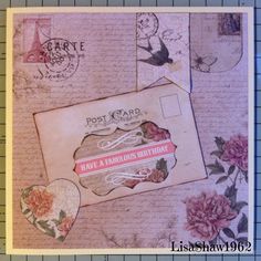 an old fashioned postcard with flowers and stamps on the front, sitting next to a piece of paper that says postcard have a fabulous birthday