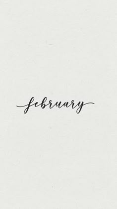 the word february written in cursive ink on a white paper with black writing