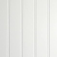 a white wall with vertical lines painted on it