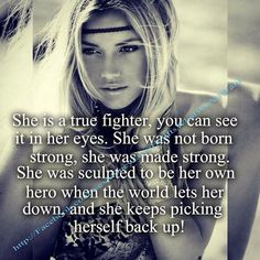 a woman with her hand on her face and the words, she is a true fighter you