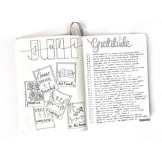 an open notebook with handwritten words and doodles on it, next to a keychain