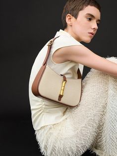 Chocolate Cesia Canvas Metallic Accent Shoulder Bag - CHARLES & KEITH US Natural Baguette Shoulder Bag For Everyday, Beige Baguette Bag With Leather Handles For Daily Use, Recyclable Shoulder Bag For Daily Use, Everyday Canvas Baguette Shoulder Bag, Beige Recyclable Tote Shoulder Bag, Beige Recyclable Shoulder Bag For Everyday Use, Eco-friendly Beige Canvas Shoulder Bag, Casual Recyclable Shoulder Bag, Everyday Beige Baguette Bag With Leather Handles