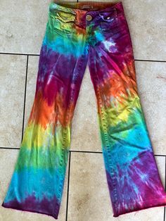 Here is a pair of, previously loved, hand dyed Rotativa designer pants. 100% cotton (algodao) and super fun! Waist measures 29". The inseam is 33" while the overall length is 39.5". One of a kind! Grab them while they are here! Please visit our shop at www.doyoudreamoutloud.etsy.com for all things unique and tie dye! 692 Rainbow Pants, Tie Dye Rainbow, Designer Pants, Womens Trousers, Pants Design, Favorite Things Gift, Trousers Women, Hand Dyeing, Labour Day