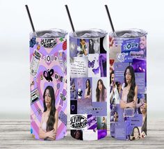 two tumblers with pictures on them are sitting next to each other