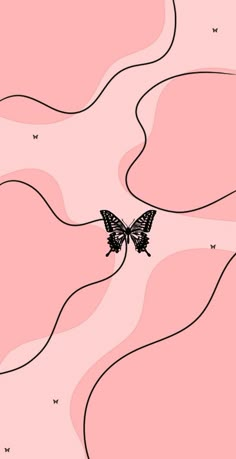 a black and white butterfly is flying over the pink hills with stars in the sky