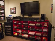 two pictures of a living room with various items on the shelves and a television in the corner