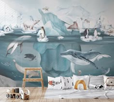 an ocean scene with penguins and polar bears on the icebergs wall mural in a child's bedroom