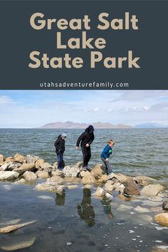 two people standing on rocks in the water with text overlay that reads great salt lake state park