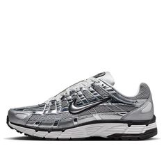 The Nike P-6000 'Metallic Silver' draws inspiration from the 2006 Air Pegasus, infusing it with futuristic flair. Its breathable metallic fabric upper features both vertical and horizontal overlays in chrome synthetic leather, creating a glistening effect. The silver side-panel Nike swoosh is outlined in black embroidery, complementing the black foxing and Nike branding on the tongue tag and heel tab. White laces match the tongue, sock liner, and insole, adorned with P-6000 branding. The comfort Nike P6000, P 6000, Trendy Shoes Sneakers, Silver Sneakers, Nike Pegasus, Style Sportif, Baskets Nike, Limited Edition Sneakers, Shoe Inspo