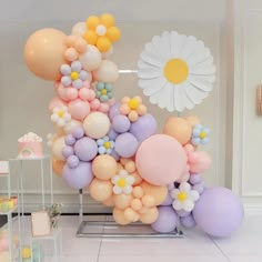 balloons and flowers on display in a room