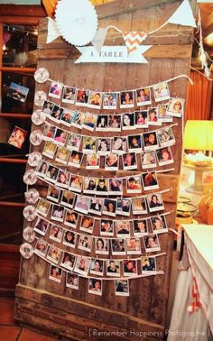 a family tree made out of photos hanging on a wall