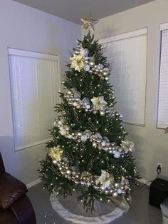 a decorated christmas tree in a living room