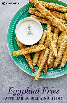 an eggplant fries with garlic oil yogurt dip on a green plate