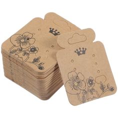 several wooden coasters with designs on them