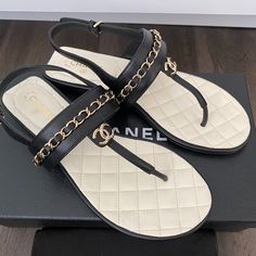 2023 Chanel Cc Logo Black Thong Leather Flat Shoes Sandals Size 37. Brand New In Box With Dust Bag. Luxury Black Leather Flip Flops, Luxury Leather Flip Flops For Beach, Luxury Leather Flip Flops With Single Toe Strap, Elegant Leather Flip Flops With Branded Insole, Luxury Leather Open Toe Flip Flops, Luxury T-strap Sandals For Beach, Designer Black Leather Flip Flops, Luxury Black T-strap Sandals, Luxury T-strap Sandals For Summer