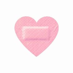 a pink heart shaped object with dots on it's side and a white background