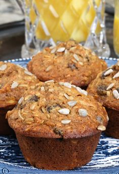 some muffins are sitting on a plate with the words, small batch morning glory muffins