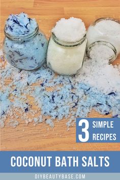 three jars filled with coconut bath salts on top of a wooden table