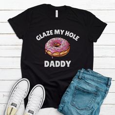 Glaze My Hole Daddy Funny Tee Funny and sarcastic gift, Sarcastic, Adult Humor Funny Meme shirt inappropriate shirt offensive bff gift dirty Humor Production Time 1-3 Business Days (average: 2 but up to 5 days) Shipping Time 1-5 Days for U.S. Orders. (average: 3) Sizing & Color info in the PHOTOS section of every listing. -All normal listings are Adult Unisex. We use DTG printing on off of our apparel. Bella & Canvas Adult Unisex T-Shirts: -Solid Colors are 100% Soft Cotton -Heather Colors are Soft Blended Fibers Product Care: -Machine Washable -Tumble Dry on Low Heat. -Do not use bleach or harsh chemicals. -We Don't Guarantee Delivery Times. This classic unisex jersey short sleeve tee fits like a well-loved favorite. Soft cotton and quality print make users fall in love with it over and o Funny Shirt Exchange Ideas, Inappropriate Shirts For Men, Inappropriate Shirts Hilarious, Bachlorette Tshirts, Obese Fashion, Unhinged Shirts, Bff Gift Ideas, Funny Tee Shirts Humour