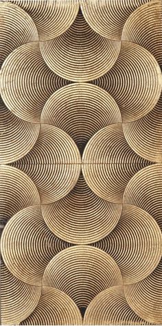 an intricately designed wall panel with circular designs