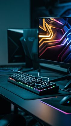 a desktop computer sitting on top of a desk next to a keyboard and monitor screen