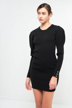 Elevate your style with this chic puff sleeve knit dress. With its elegant and timeless silhouette, this dress is a must-have for any fashion-forward woman. The fitted waist and flared skirt create a figure-flattering look, while the ribbed neckline ensures a comfortable fit. Perfect for any special occasion, this dress will have you looking and feeling your best. Puff shoulder long sleeves Ribbed neckline Fitted silhouette Hand wash cold Do not bleach Do not tumble dry Iron low Shell: 50% Visco Chic Fitted Puff Sleeve Dress For Fall, Chic Fall Puff Sleeve Dress, Evening Ribbed Mini Sweater Dress, Elegant Mini Sweater Dress For Work, Elegant Bodycon Sweater Dress In Solid Color, Evening Mini Ribbed Sweater Dress, Chic Puff Sleeve Dress For Fall Formal Event, Elegant Sweater Dress For Work, Chic Puff Sleeve Dress For Formal Fall Event