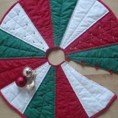 a red, white and green quilted christmas decoration