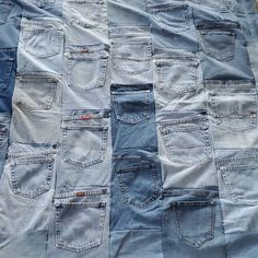 an old patchwork denim blanket with several different colors and sizes on the bottom half