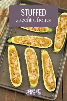 stuffed zucchini boats on a baking sheet