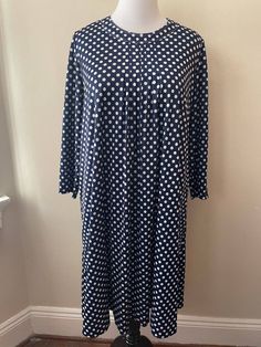 "Vintage 60's long sleeve blue and white polka dot swing dress by Amy Adams, no size tag. Zip up back, layered ruffles on front of dress. Possibly maternity dress. Please ask questions!  Measurements (laid flat):  Length: 42\" Pit to Pit: 21\"x2 Waist: 24\"x2 Hips: 28\"x2 Condition: Excellent vintage condition, no issues noted.  The vintage pieces I sell have all led a previous life and may tell their stories through minor imperfections. I'll do my best to indicate overall condition, but please refer to the pictures. Your purchase continues the life of this garment...what stories will you tell while wearing it?  Please note there may be a slight difference in color when comparing the actual garment to the monitor image. (0802)" White Polka Dot Dress, Amy Adams, Previous Life, Maternity Dress, Vintage Pieces, Vintage 60s, Yellow And Brown, Polka Dot Dress, Ugly Sweater