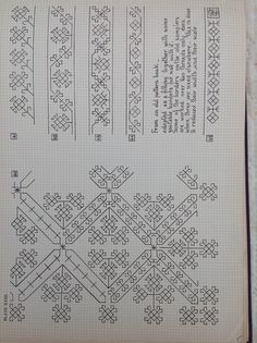 an old book with cross stitch patterns on it