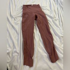 Looks New Worn Once Has Squiggle Ends Looks Brand New! Burnt Orange Leggings, Orange Leggings, Burnt Orange, Color Orange, Colorful Leggings, Pant Jumpsuit, Lululemon Athletica, Size 2, Pants For Women