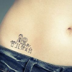 a woman's stomach with a small family tattoo on the side of her belly