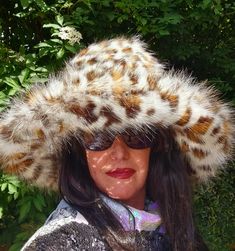 ❤️Lovely Leopard Print fake fur hat. ❤️Oversized, wide brimmed, fluffy bucket hats. ALL made by me in England. ❤️Each hat made to order, especially for you so ANY head size accommodated for! If you don't see your size in my drop down list, then message me and I will make one your size. ❤️The brim is just over 7 inches wide, but does look wider as the fabric is very fluffy, and the pile is approx 2 inches long. ❤️I have put wire inside the brim so you can shape your hat and keep out of your face! Big Fluffy Bucket Hat, Blonde Wearing A Cow Print Faux Fur Bucket Hat, Big Fur Hat, Fluffy Faux Fur Wide Brim Hat, Fluffy Bucket Hat, Fuzzy Bucket Hat, Custom Fitted Hats, Leopard Print Fur Hat, Oversized Hat