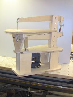 a workbench made out of plywood and wood