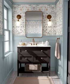 a bathroom with pink walls and green vanity in the center, along with floral wallpaper