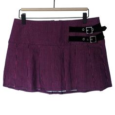 Current Mood Women's "Feeling The Blues" Magenta Black Pinstripe Mini Skirt Features: This Mini Skirt Comes With Belt Buckle Details, Pleating Details, And A Pinstripe Pattern. Non-Stretch Waist. Condition: New With Tags (Nwt) No Wear No Flaws Smoke-Free Pet-Free Size: L Measurements: Length: 13.5" (Mini Fit) Waist: 16" Hip: 19" Color: Dark Magenta / Black Material: 76% Viscose 21% Polyamide 3% Elastane Care: Hand Wash Cold No Bleach Dry Flat Iron Low Do Not Dry Clean Made In China About Me: I A Y2k High Waist Pink Skirt, Pink Fitted Mini Skirt Y2k Style, Fitted Pink Punk Style Bottoms, Fitted Pink Punk Bottoms, Pink Punk Style Fitted Bottoms, Pastel Goth Fitted Skirt, Fitted Edgy Purple Bottoms, Edgy Fitted Purple Bottoms, Pink Fitted Bottoms 90s Style