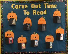 a bulletin board with pumpkins cut out to read the words carve out time to read