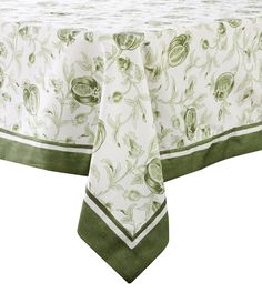 a table cloth with green and white designs on it