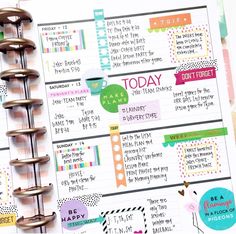 an open planner with lots of stickers on it