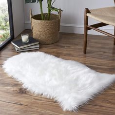 PRICES MAY VARY. 【Material and Pile】The biggest feature of this Luxury Faux Fur Rug is its thicker and longer pile. The shag rugs is made from velvety polyester material featured high-density 2.5 inch long surface pile that gives a super soft touch feeling under your feet. Through a sanitation process, hypoallergenic, no odor, not easy to fade and not easily contaminated by dust. 【No-Slip Bottom】The fluffy rug features anti-sliping suede leather lining back design and wear-resistant bottom perfe Fuzzy Carpet, Carpet Cute, Bedroom Layout Ideas, Rug For Nursery, Rug For Kids Room, Small Seating Area, Faux Fur Area Rug, Bedroom Arrangement, Bedroom Furniture Layout