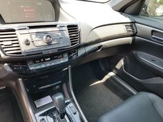 the interior of a car with electronic controls