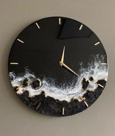 a clock that is on the wall with waves