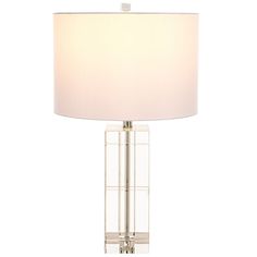 a clear table lamp with a white shade on the top and bottom part of it