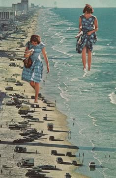 two girls are walking along the beach with cars parked on the shore and in the water