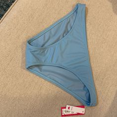 Nwt Xhiliration Blue Cheeky Bikini Bottoms. Size Large. These Are A Dark Baby Blue Color. Pay Current List Price Or Consider Special Offer: Select Any Of My Listings That Reflect This Special Offer Of 2/$15.00 By Adding Those Items To Your Bundle And I Willl Offer You Pricing Of 2/$15 On That Bundle! Trendy Blue Stretch Swimwear, Trendy Brief Swimwear For Beach Season, Light Blue Seamless Swimwear For Spring, Trendy Blue Bottoms For Beach Party, Blue Brief Swimwear For Spring, Blue Spring Swimwear Brief, Trendy Blue Bottoms For Pool, Baby Blue Color, Baby Blue Colour