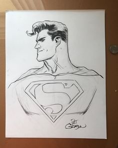 a drawing of a man in a superman suit