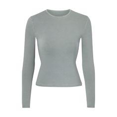 Stretch T-shirt For Layering, Solid Color Tops With Thumbholes For Loungewear, Fitted Loungewear Tops With Thumbholes, Loungewear Tops With Thumbholes, Fitted Tops With Thumbholes For Loungewear, Snug Fit Crew Neck Top In Athleisure Style, Snug Fit Crew Neck Top For Athleisure, Basic Fitted Long Sleeve T-shirt, Fitted Long Sleeve Basic T-shirt